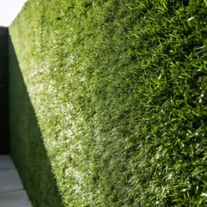 Outdoor artificial turf wall transforming fences, construction sites, and modern gardens banner
