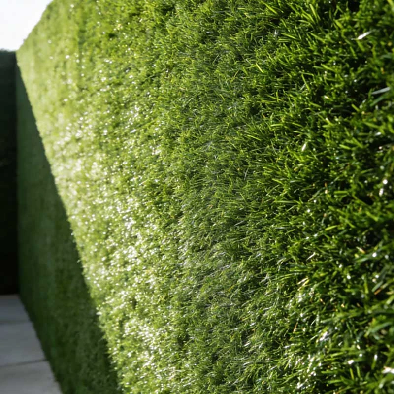 Outdoor artificial turf wall transforming fences, construction sites, and modern gardens banner
