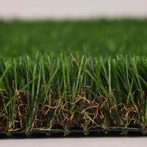 Side view of X-Nature HBA40 faux grass lawn showing high pile height, multi-color green blades, and realistic brown thatch layer banner