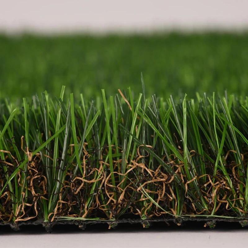 Side view of X-Nature HBA40 faux grass lawn showing high pile height, multi-color green blades, and realistic brown thatch layer banner