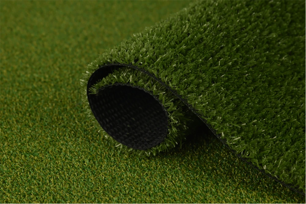 X-Nature Grass 108J artificial grass roll, showcasing details of the 10mm pile height and single-layer black backing.
