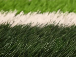 DJK50 50mm reinforced sports turf showing high-density PE grass fibers