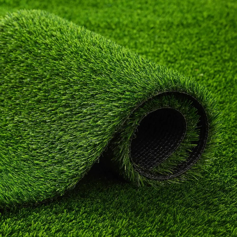 Detailed view of indoor synthetic grass roll showing the high-density backing and soft green fibers