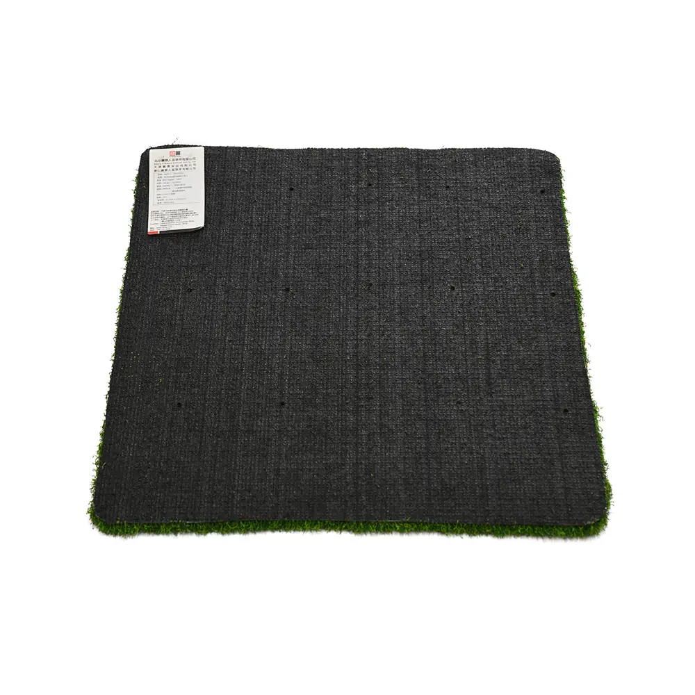 Water permeable backing of playground artificial turf sample with drainage holes and label