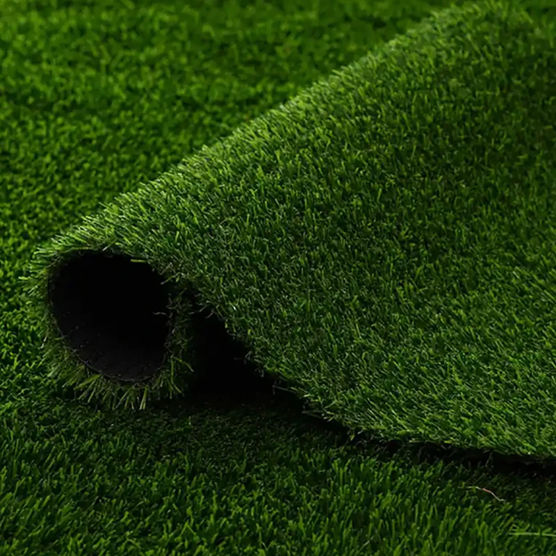 close up of green artificial turf fibers and backing